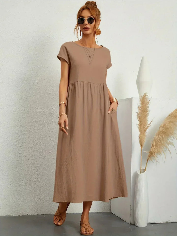 Gabrielle™ — Elegancka, midi sukienka o swobodnym kroju